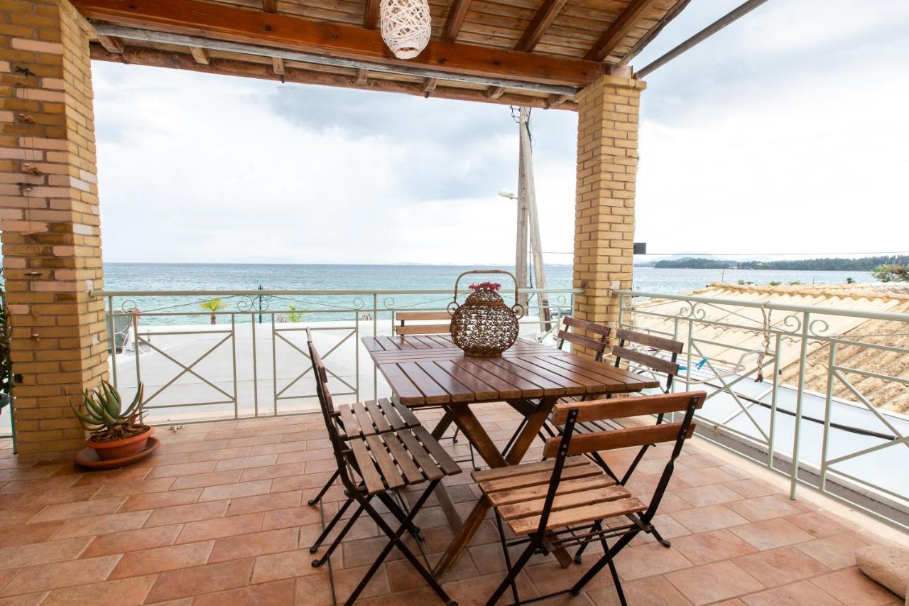 Seaview Stone Apartment In Ipsos Beach Exterior photo