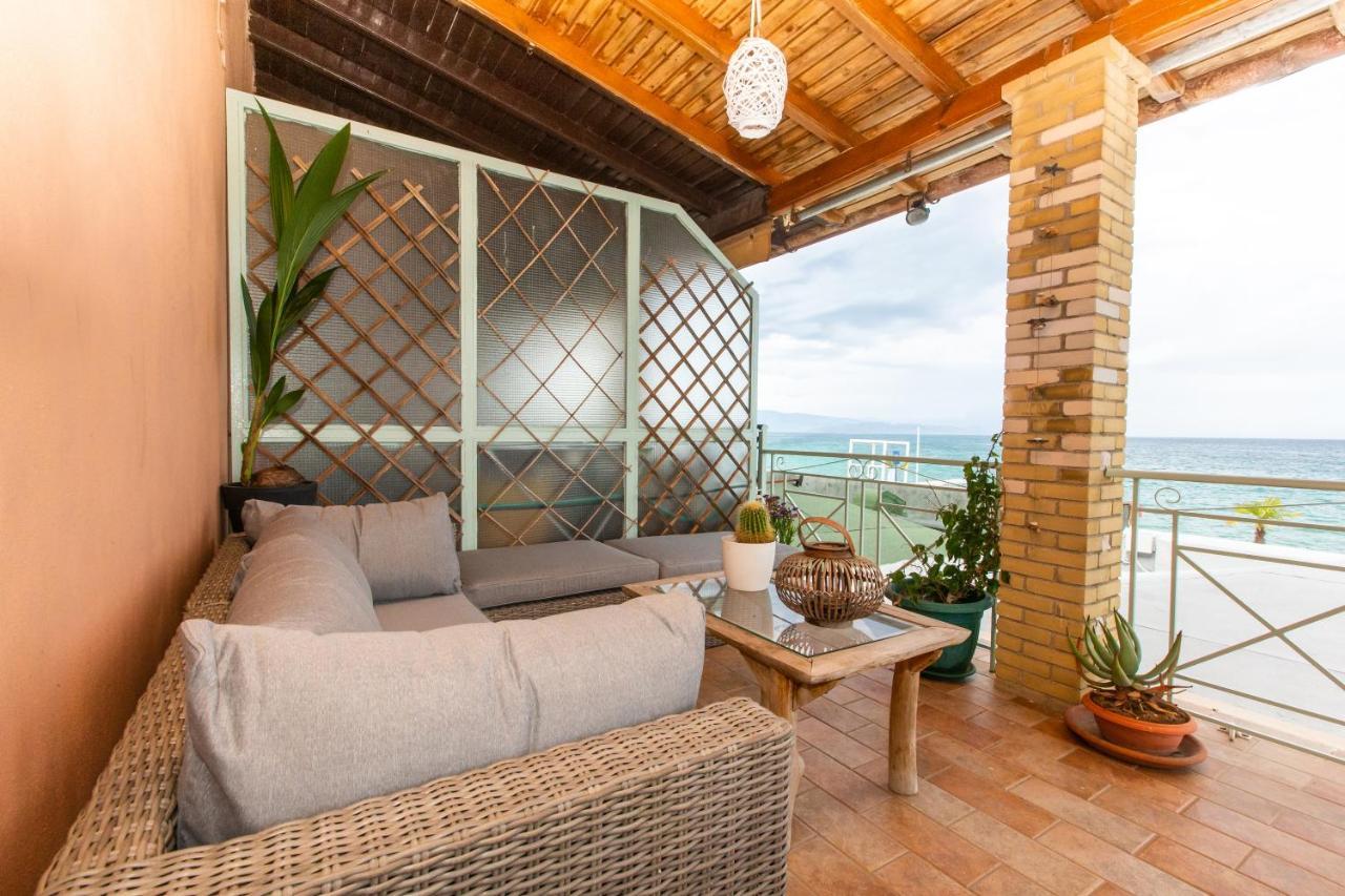 Seaview Stone Apartment In Ipsos Beach Exterior photo